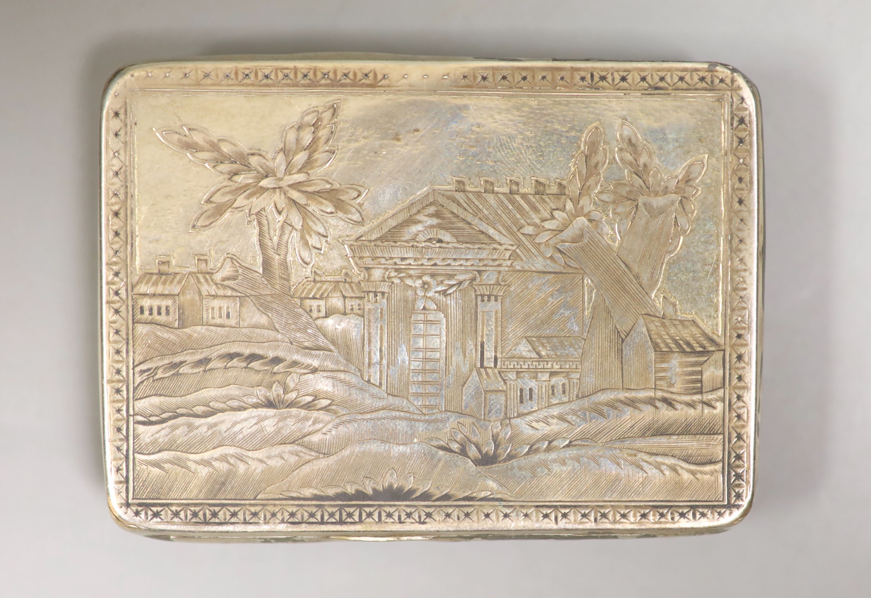 A late 19th/early 20th century Russian silver snuff box, 87mm, 100 grams, (a.f.).